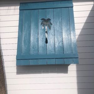 Bermuda style shutters with cut outs